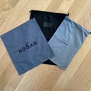 Three designer dust bag covers